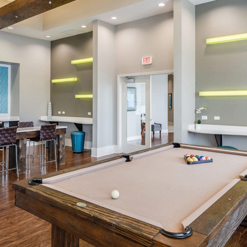 billiards table in game room