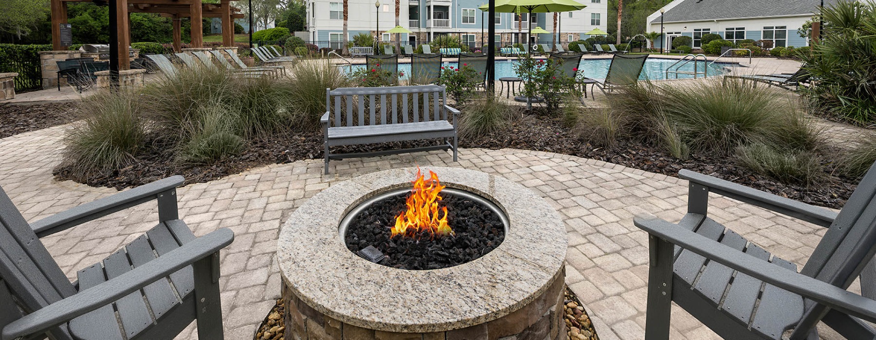 lawn chairs around fire pit