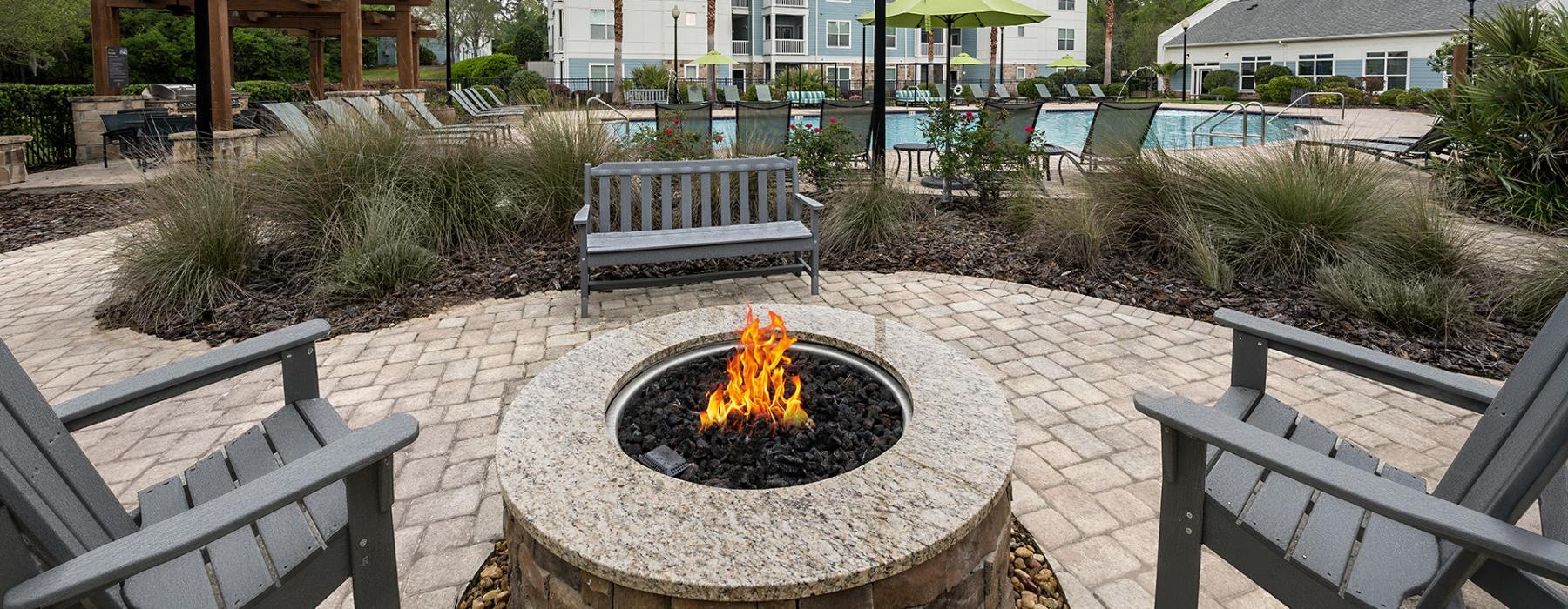 lawn chairs around fire pit