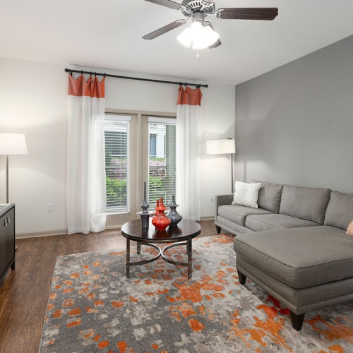 spacious living room with large windows
